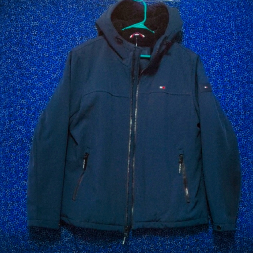Med. Size Tommy Hilfiger weatherproof, waterproof jacket with faux fur liner.